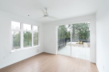 Henley Place Apartments in Milwaukie, Oregon Dining Area with Oversized Windows and Patio
